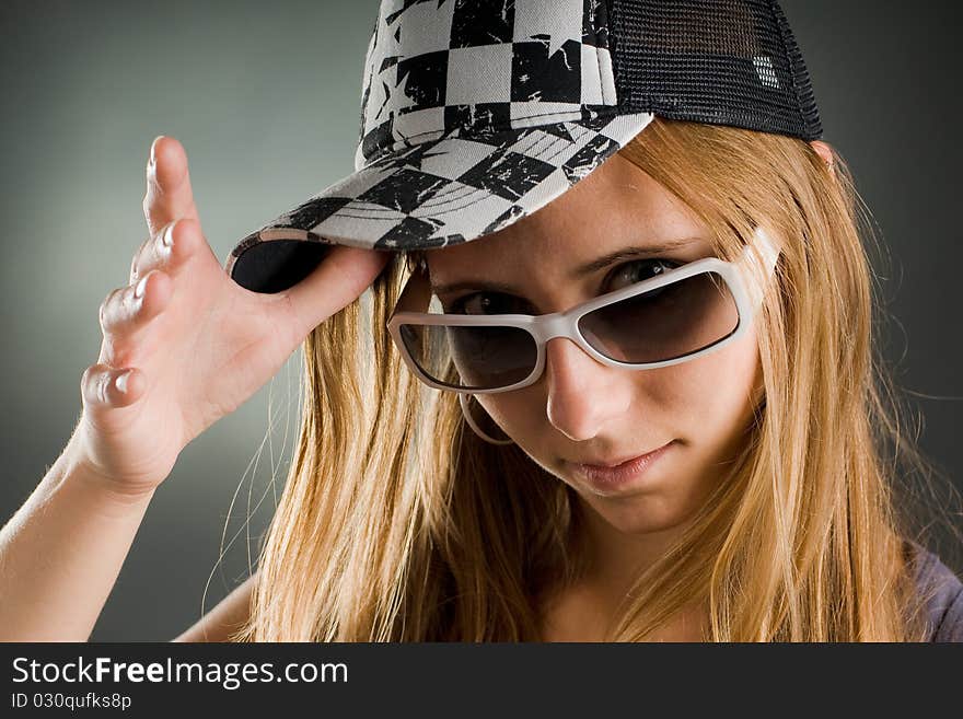 Woman With Sunglasses And Basecap