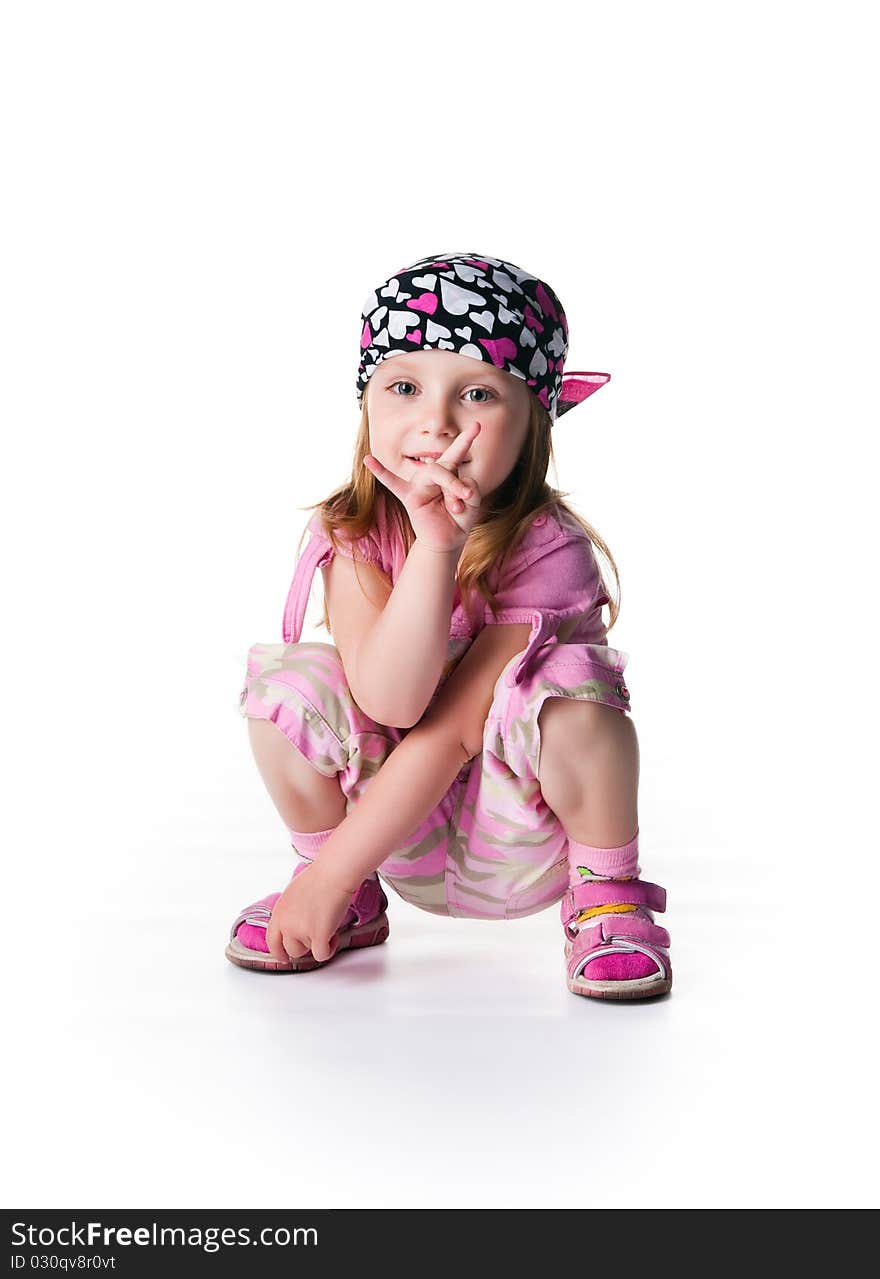 Little girl in bandana on white background