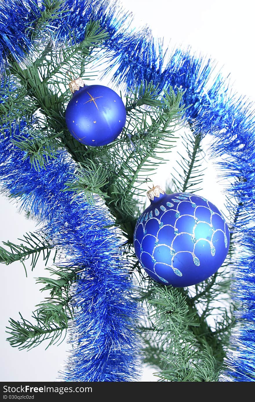 Two blue christmas ball on a christmas tree. Two blue christmas ball on a christmas tree