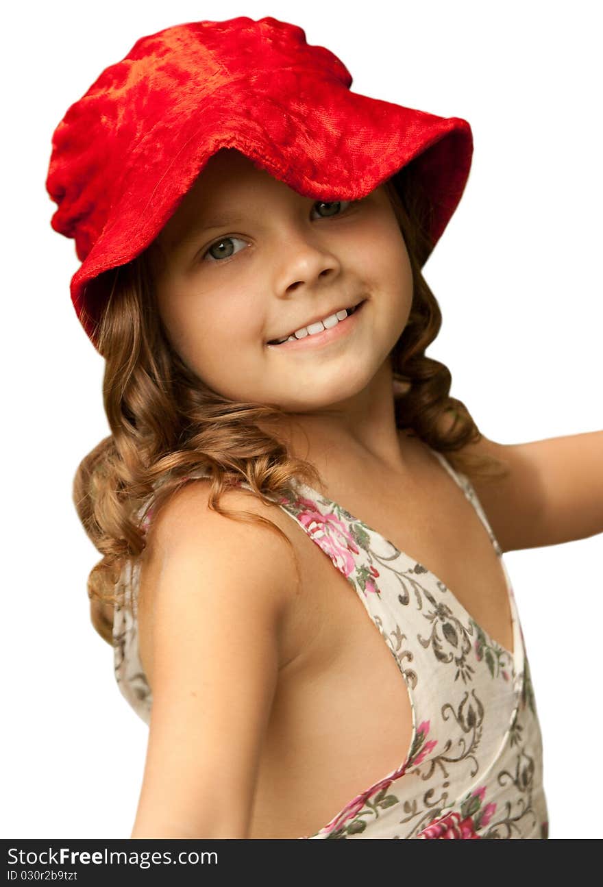 The little smiling girl in a red hat. Isolated on a white.