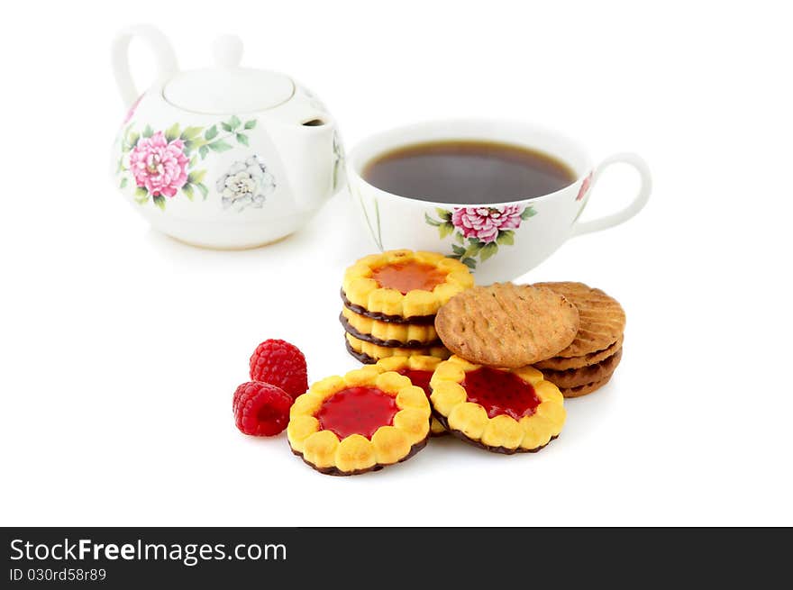 Shortbread cookies with jam centre and chocolate bottom for tea drinking. Isolated on white background. Shortbread cookies with jam centre and chocolate bottom for tea drinking. Isolated on white background