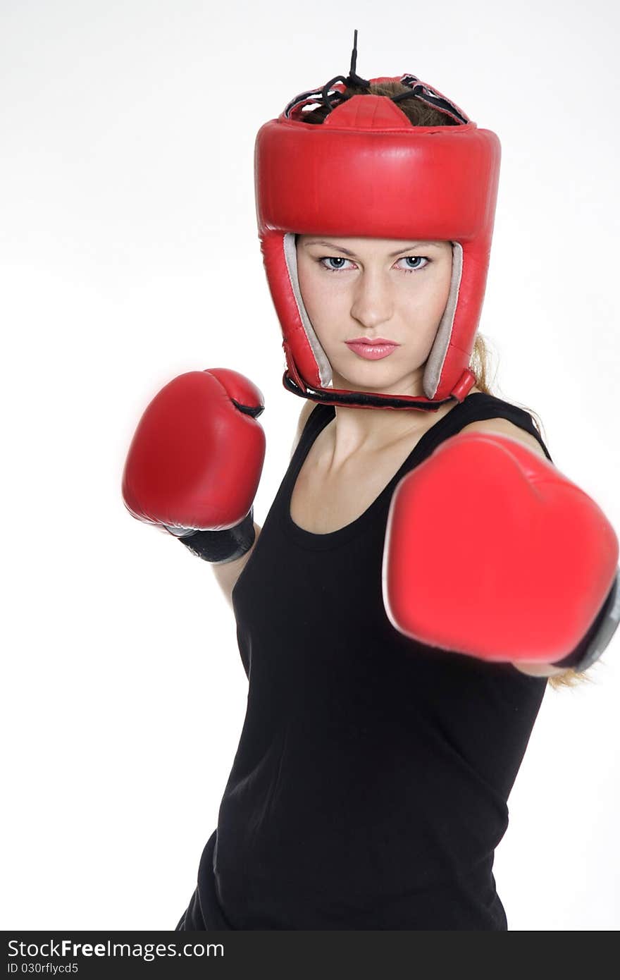 Attractive female boxer over white