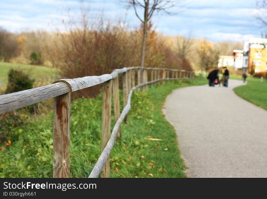 An image of a Fence with shallow depth of field in European suburb area