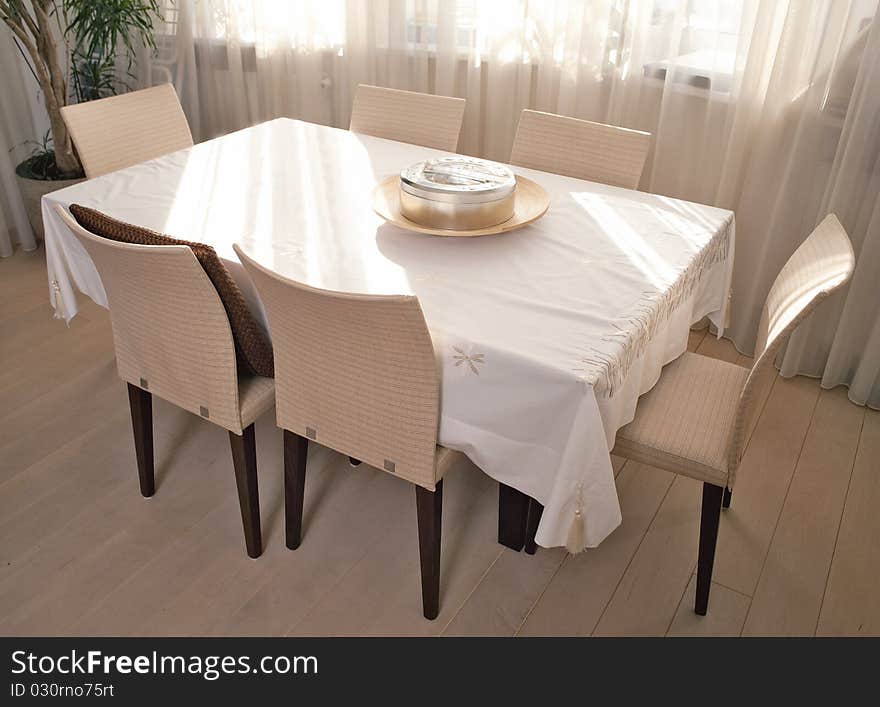 Interior of a dinning room with dinning table