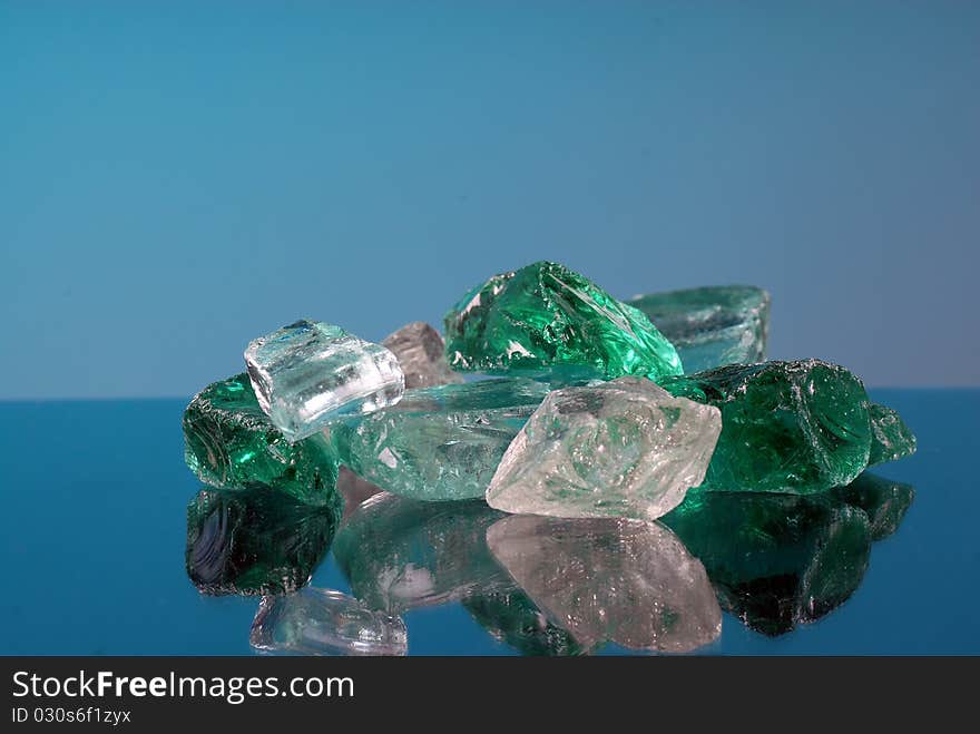 White and green pieces of glass rocks. White and green pieces of glass rocks