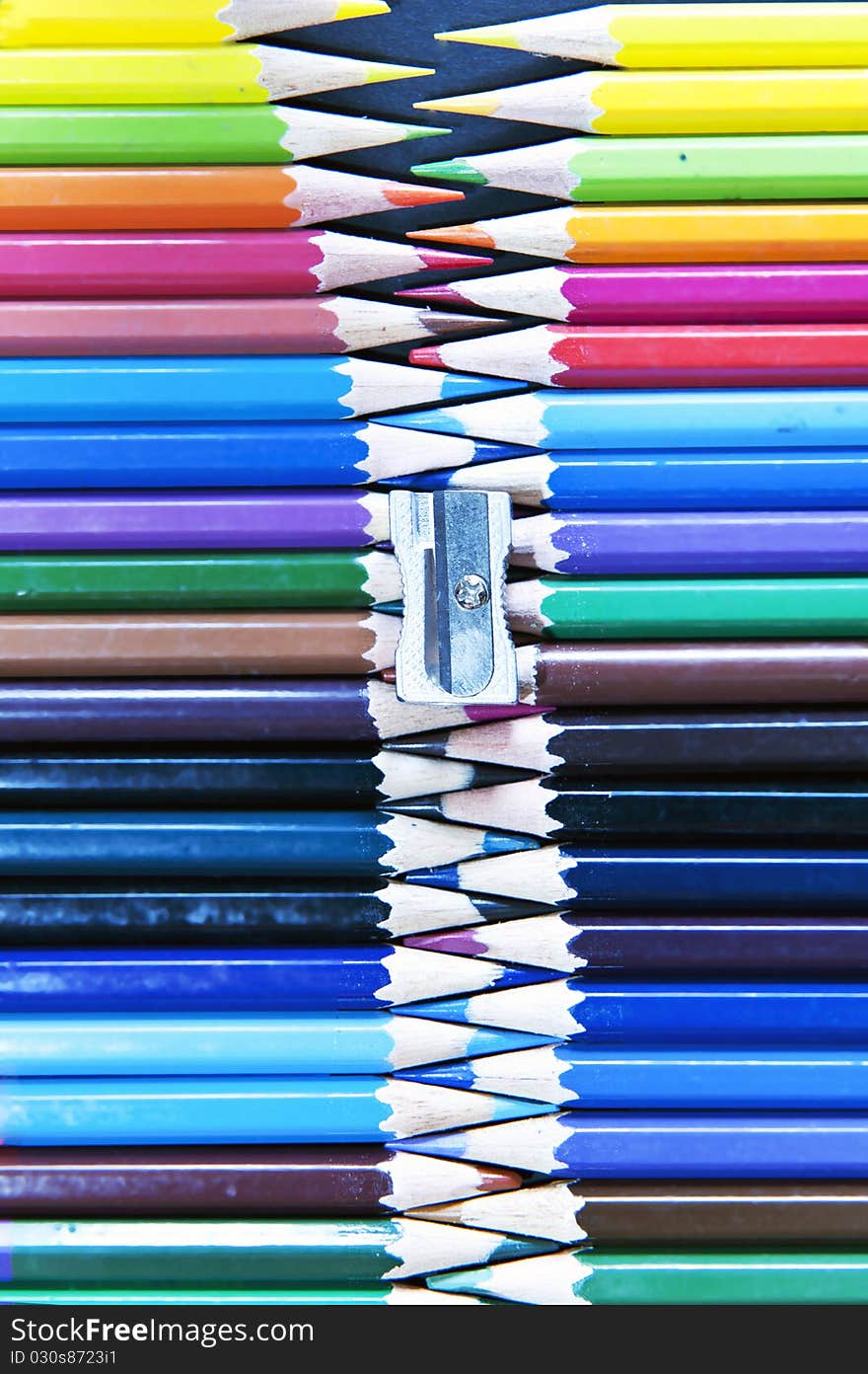 Color pencils line up in zip shape