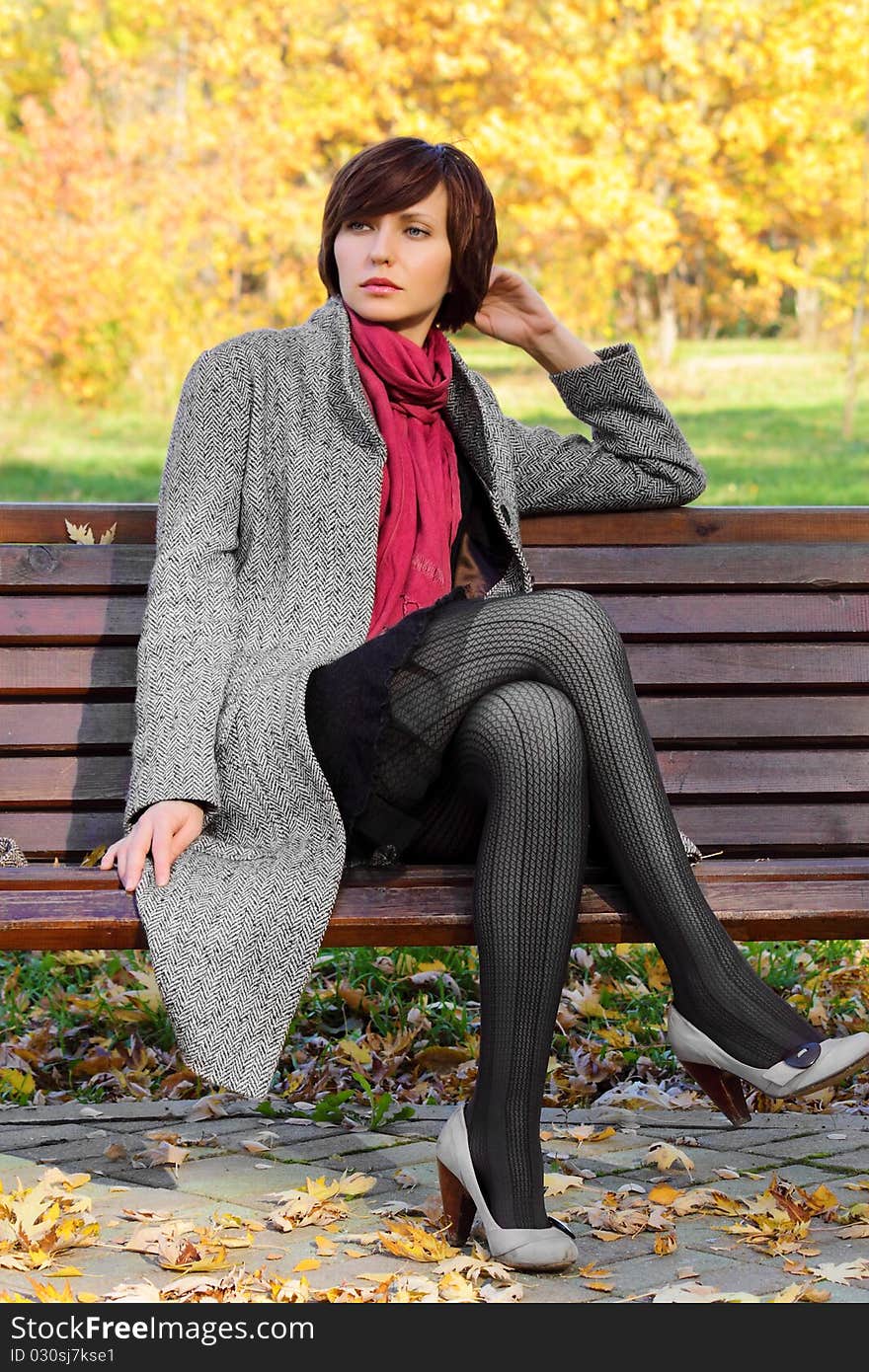 Girl in the park on a bench