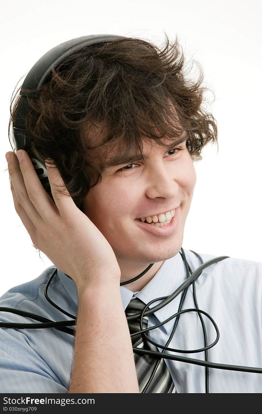 An image of a young man listening to music