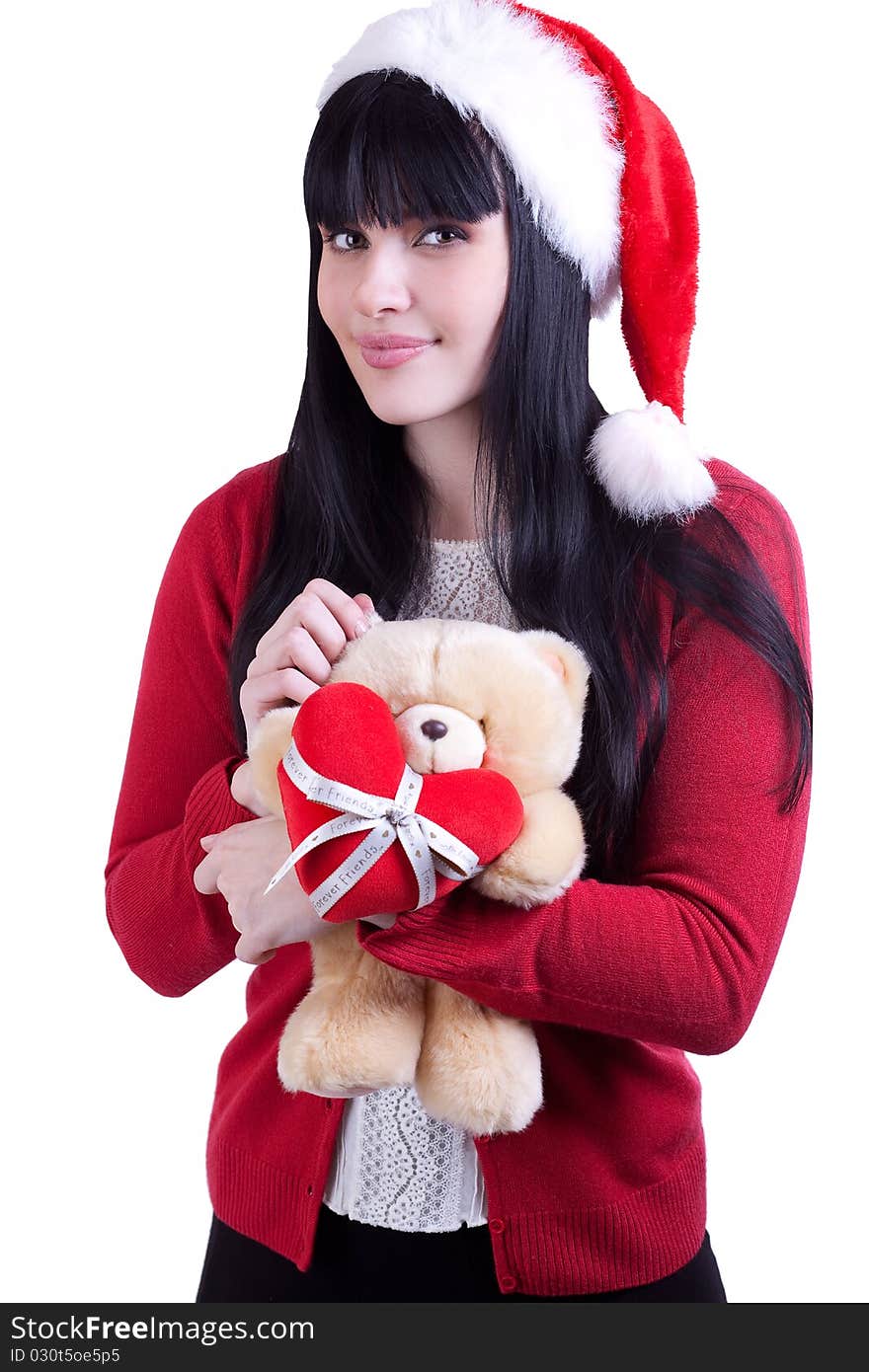 Pretty girl in red hat with teddy bear on white. Pretty girl in red hat with teddy bear on white