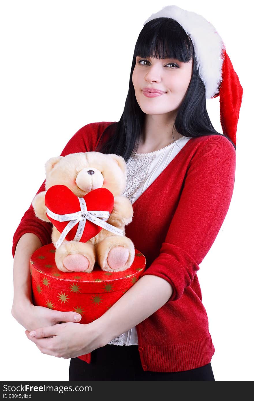 Pretty girl in red hat with teddy bear and box on white. Pretty girl in red hat with teddy bear and box on white