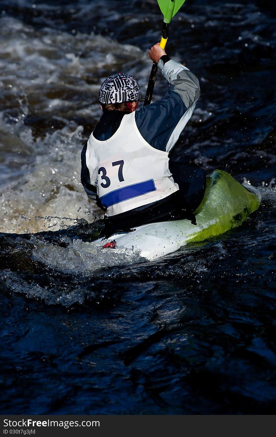 Competition of kayak freestyle on whitewater