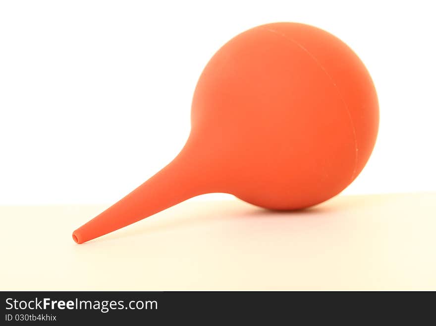 Child's nasal aspirator isolated on a white background. Child's nasal aspirator isolated on a white background