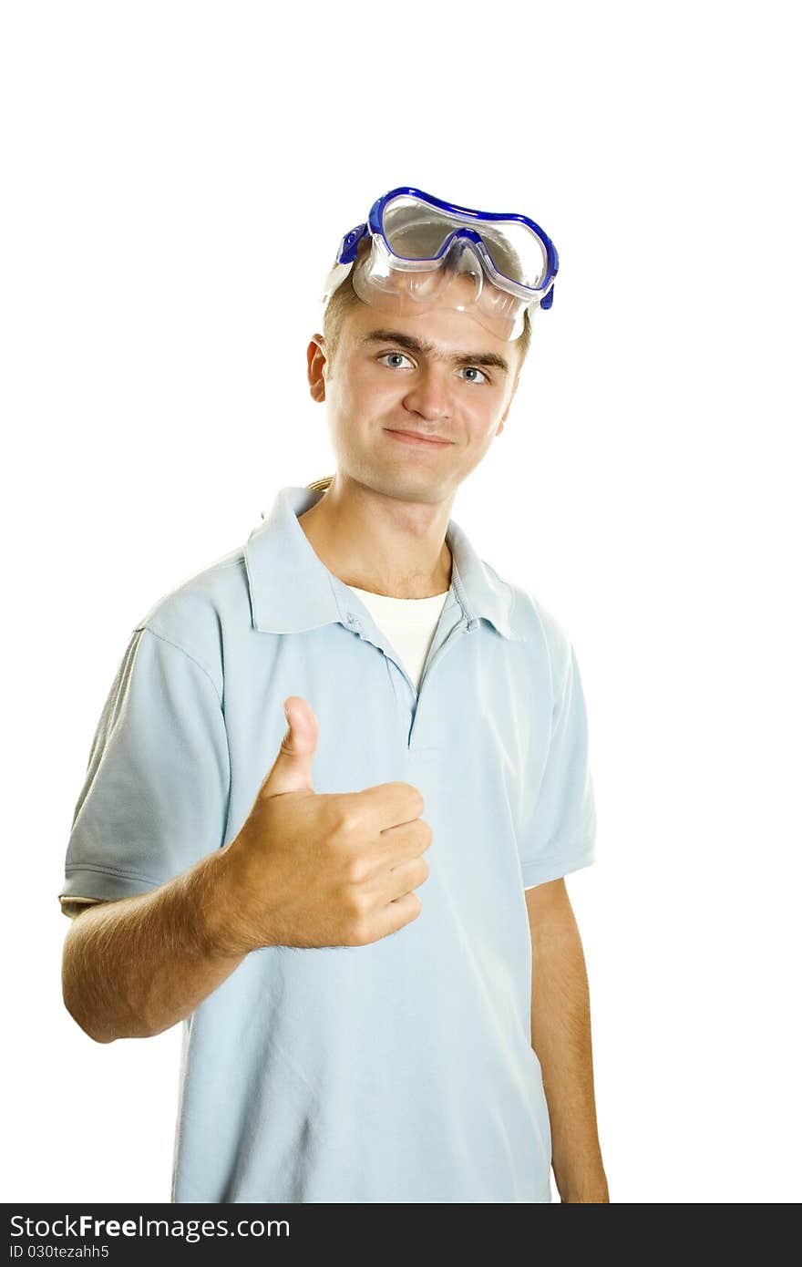 Young man in a T-shirt on his head wearing a mask for diving. Isolated on a white background. Young man in a T-shirt on his head wearing a mask for diving. Isolated on a white background