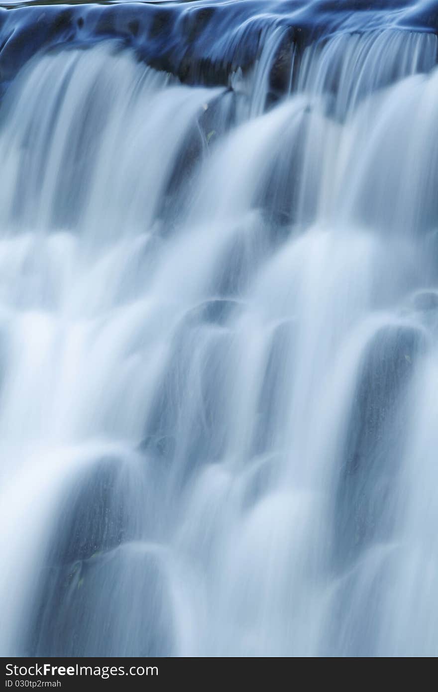 Waterfall on mountain river