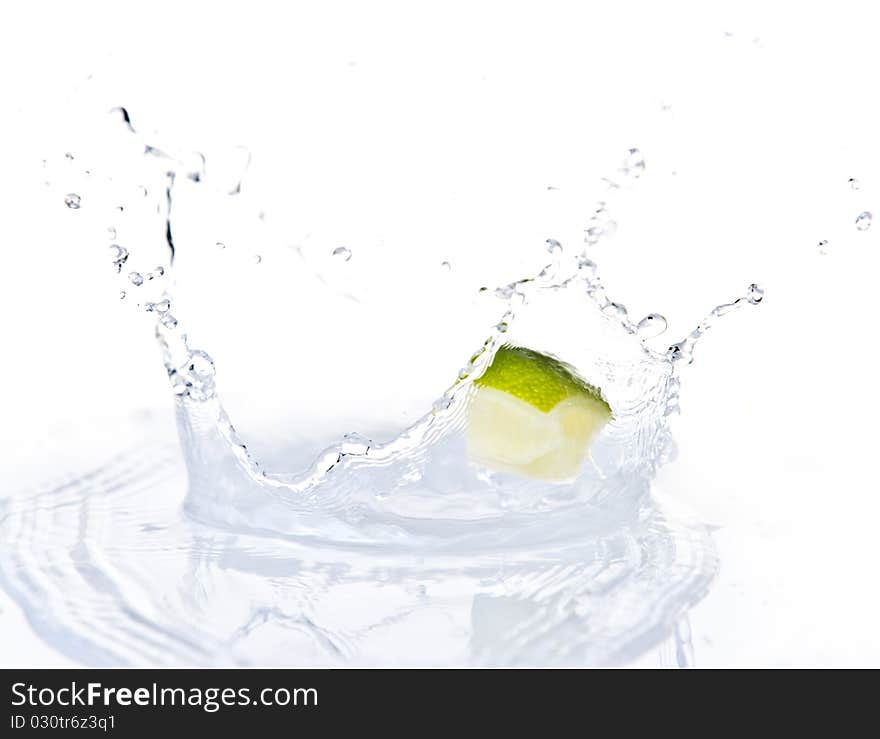 Fruits falling in water on white background