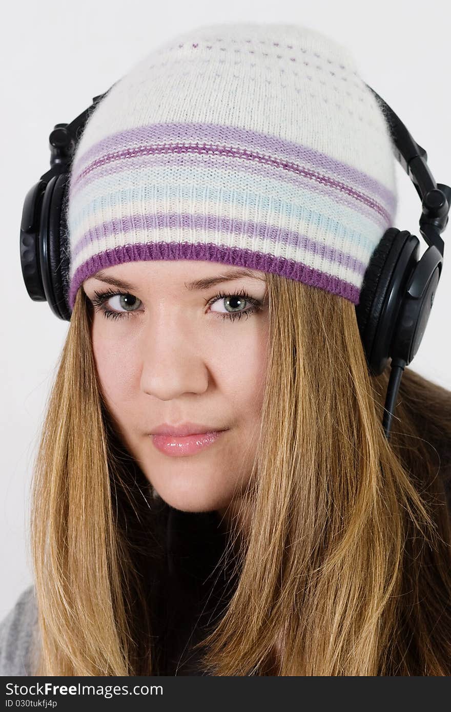 Young Pretty Girl In Headphones