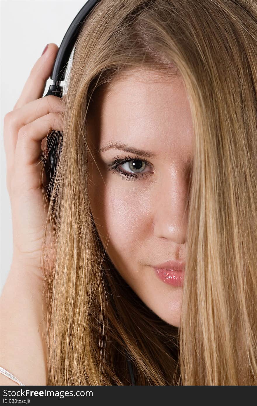 Young pretty girl in headphones