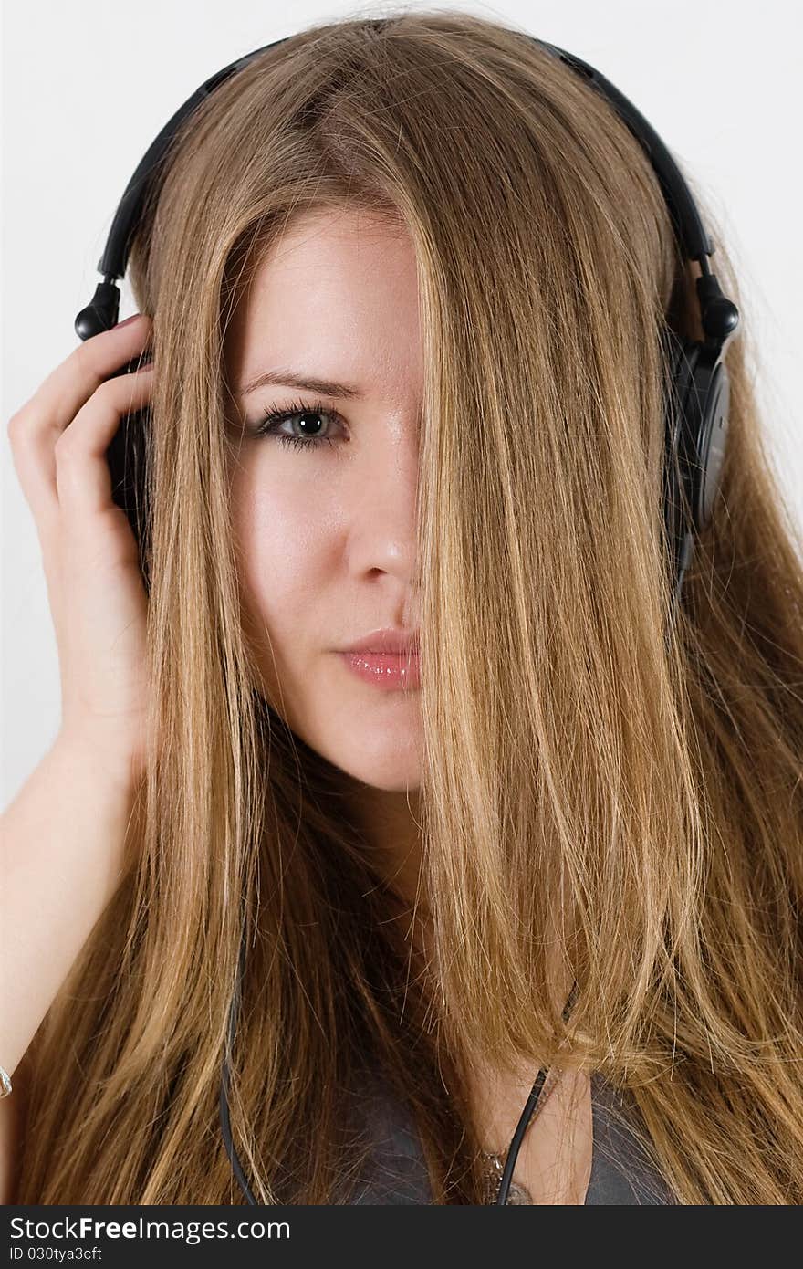 Young pretty girl in headphones