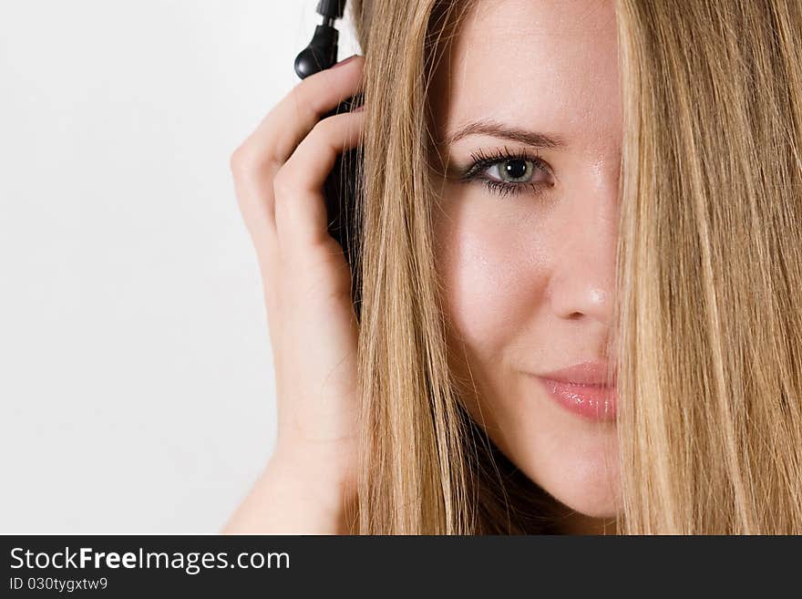 Young attractive girl in headphones