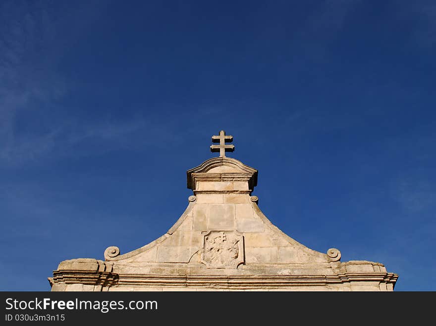 The gate of monastery of the Holy Cross in Poland.