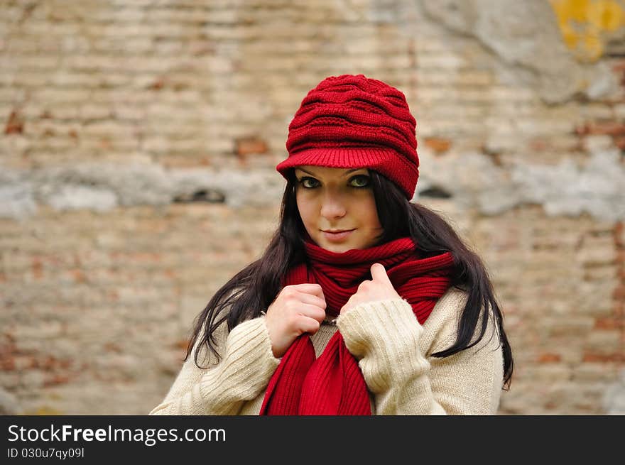 Autumn beauty woman wit red scarf and cap