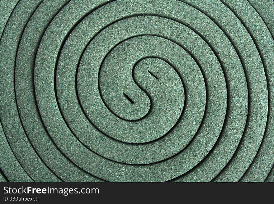 Close up image of classic green mosquito spiral. Close up image of classic green mosquito spiral