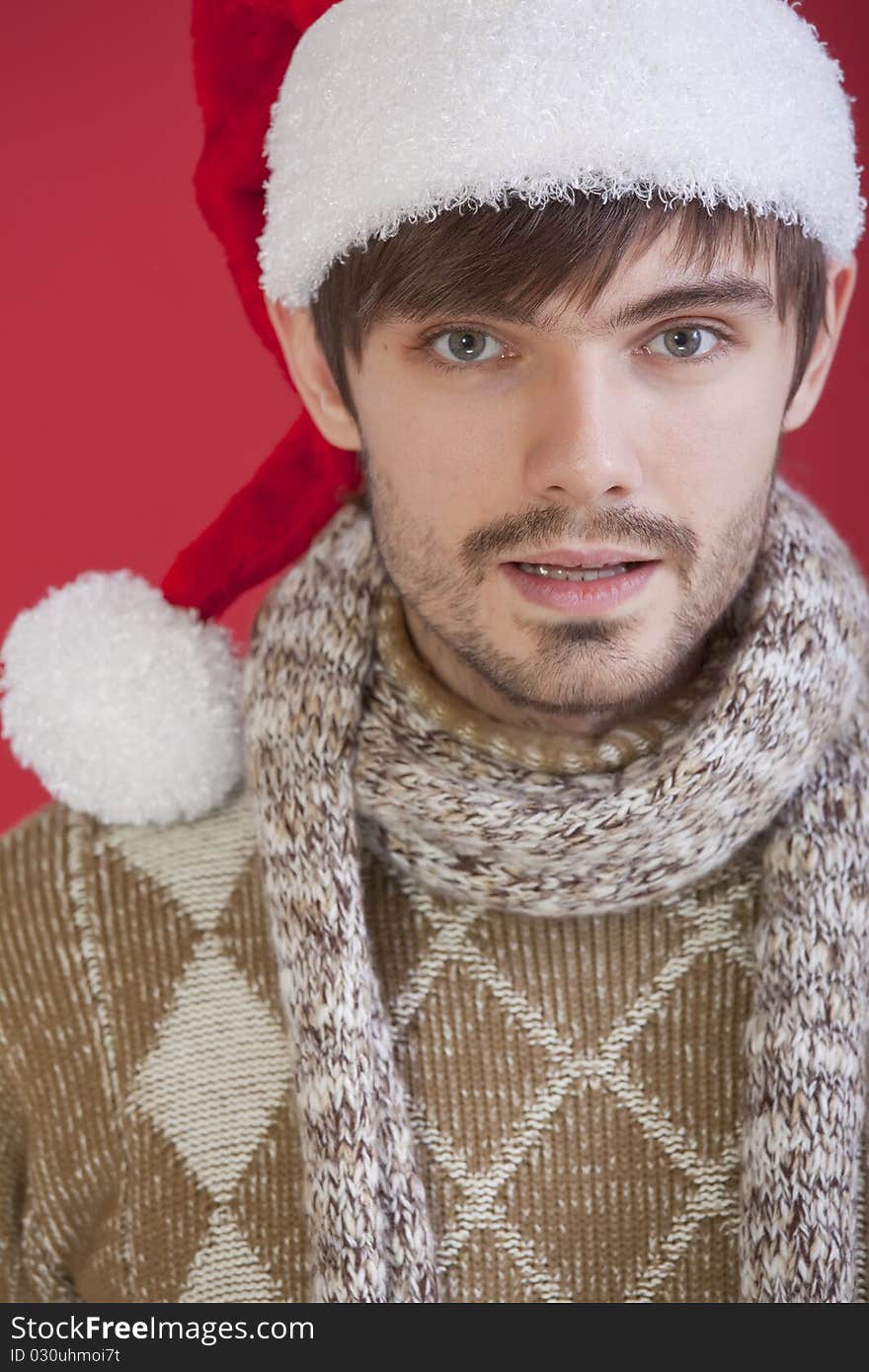 Young man in santa hat