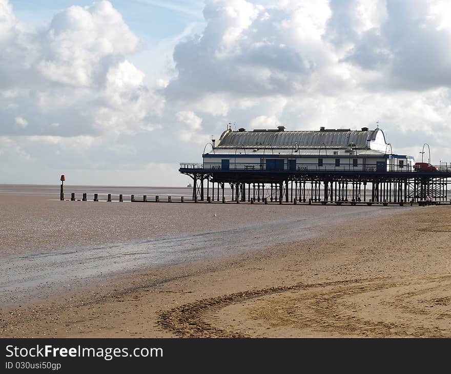 English Pier standind on stilts at low tide