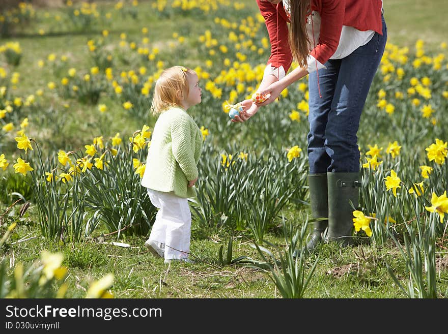 Mother And Daughter With Decorated Easter Eggs