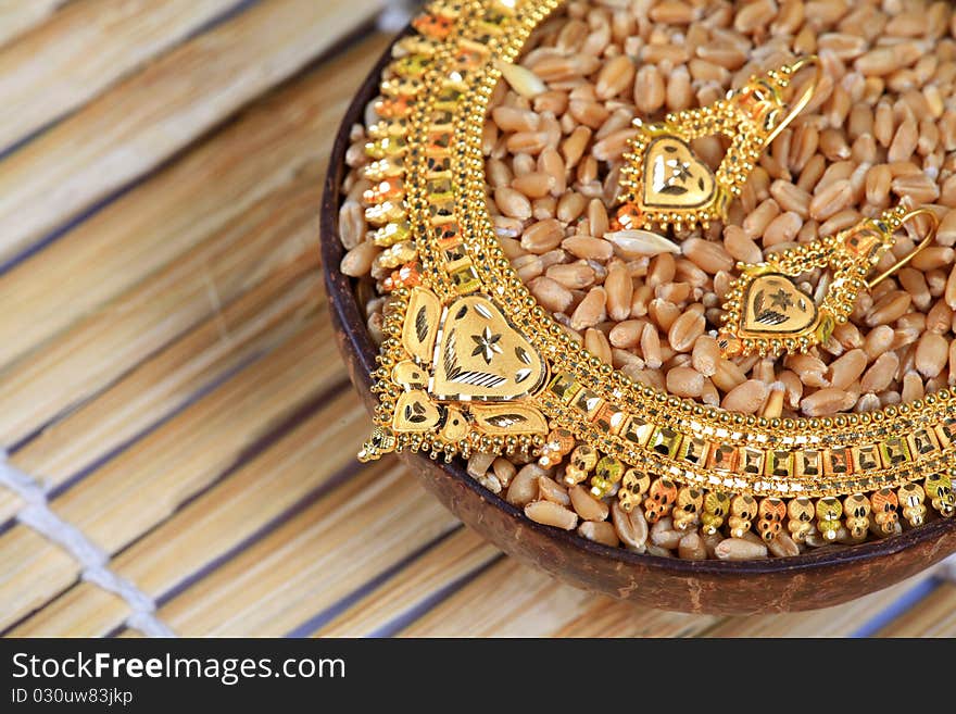 Golden necklace and ear-rings jewellery