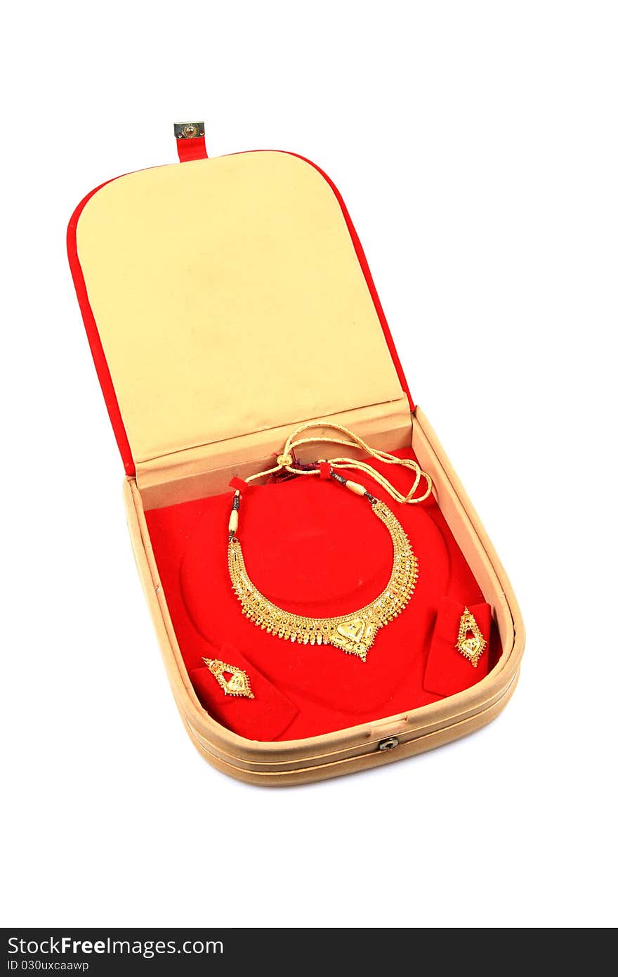 Golden necklace and ear-rings jewellery