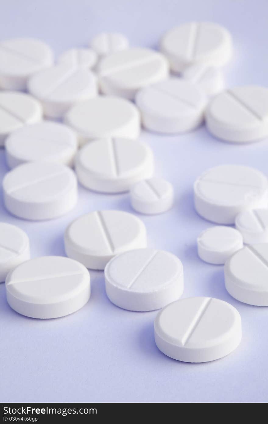 Close up of tablets on a white background