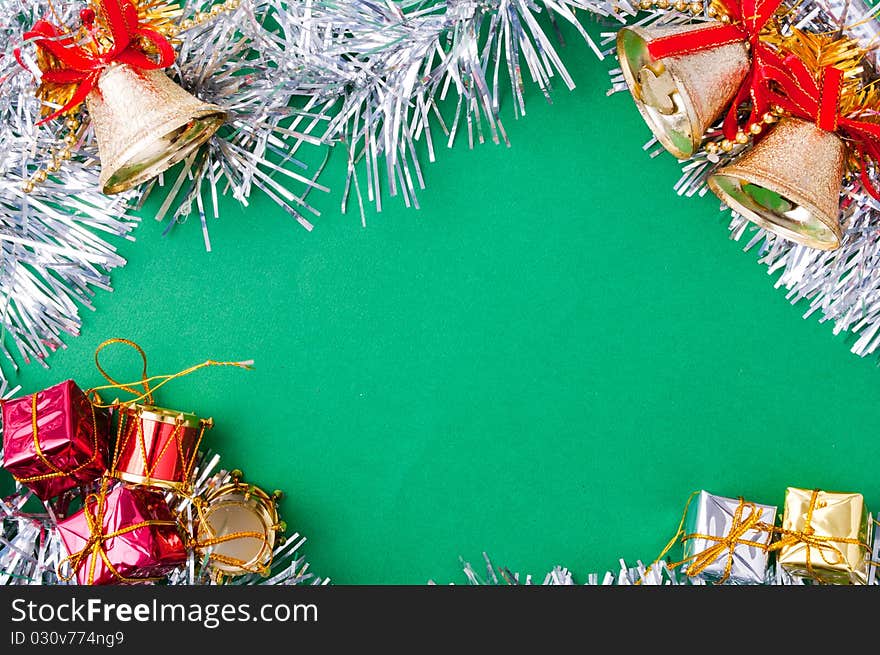 Christmas decoration objects on light green background. Christmas decoration objects on light green background