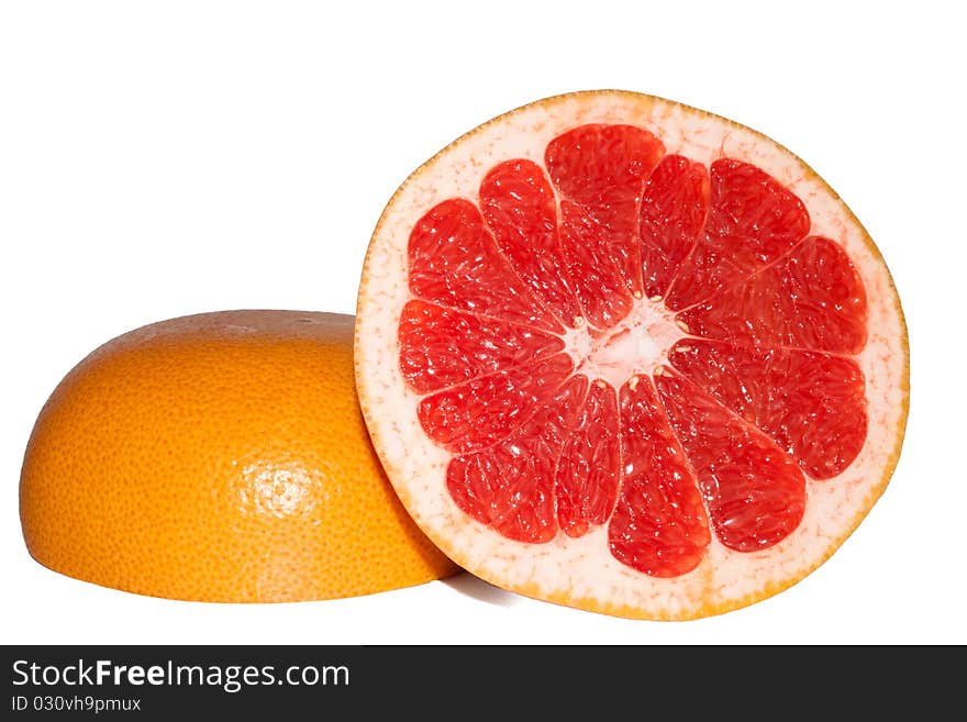 Two piece of fresh grape-fruit on white background. Isolated. Two piece of fresh grape-fruit on white background. Isolated