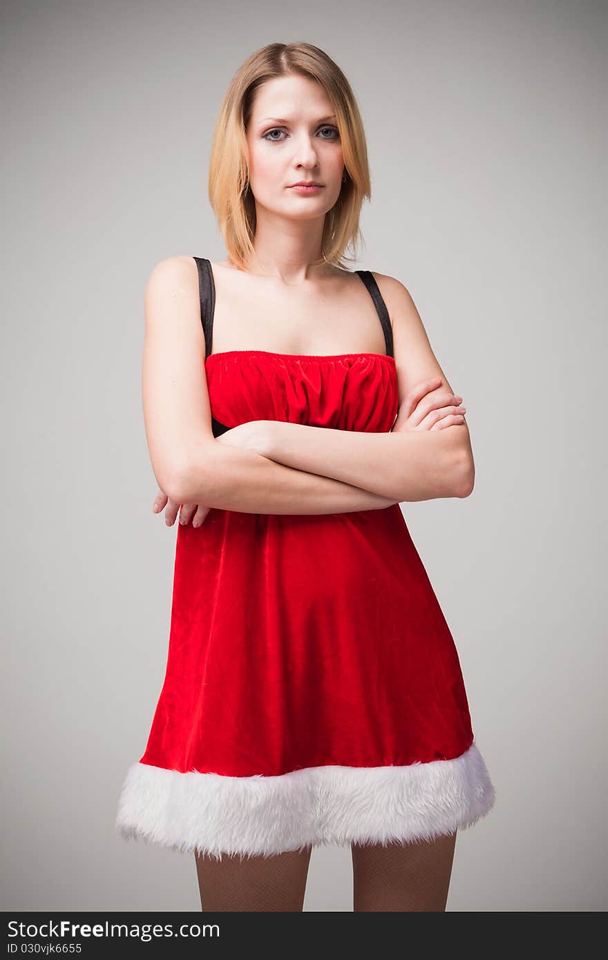 Christmas girl portrait on gray background