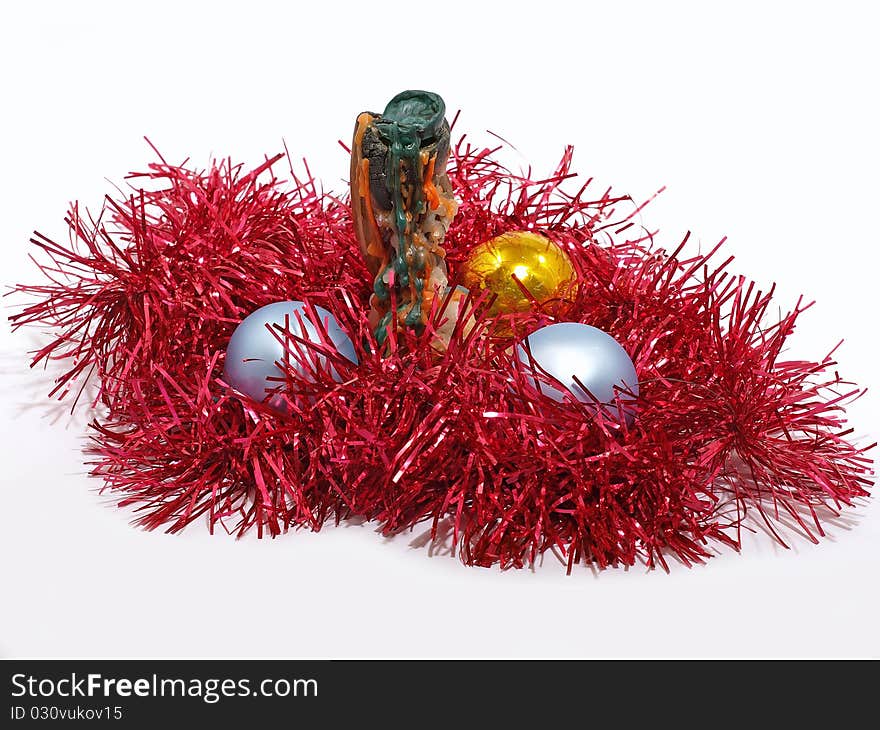 Candlestick with wax and color Christmas balls.Isolated. Candlestick with wax and color Christmas balls.Isolated