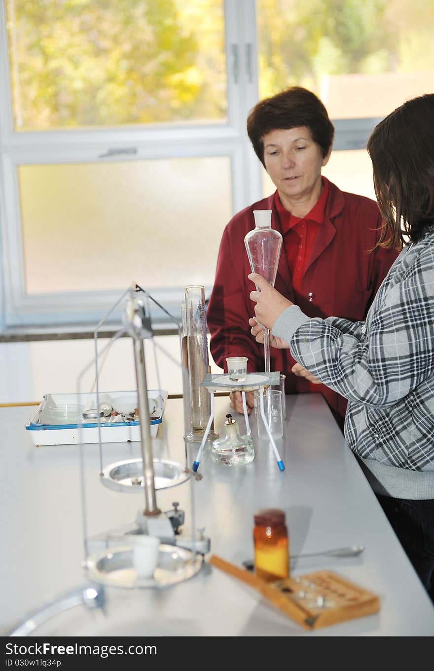 Science and chemistry classees at school with smart children and teacher