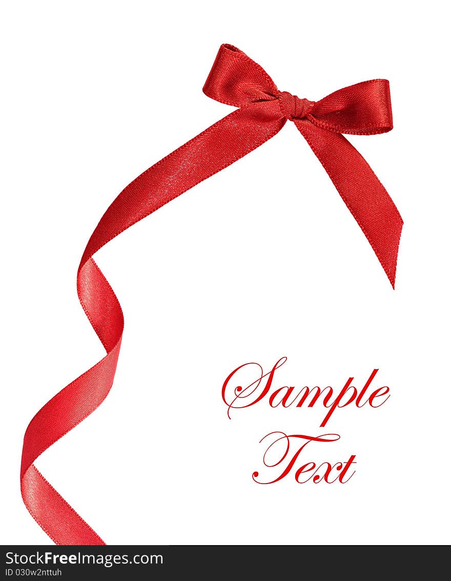 Shiny red satin ribbon on white background with copy space. Shiny red satin ribbon on white background with copy space