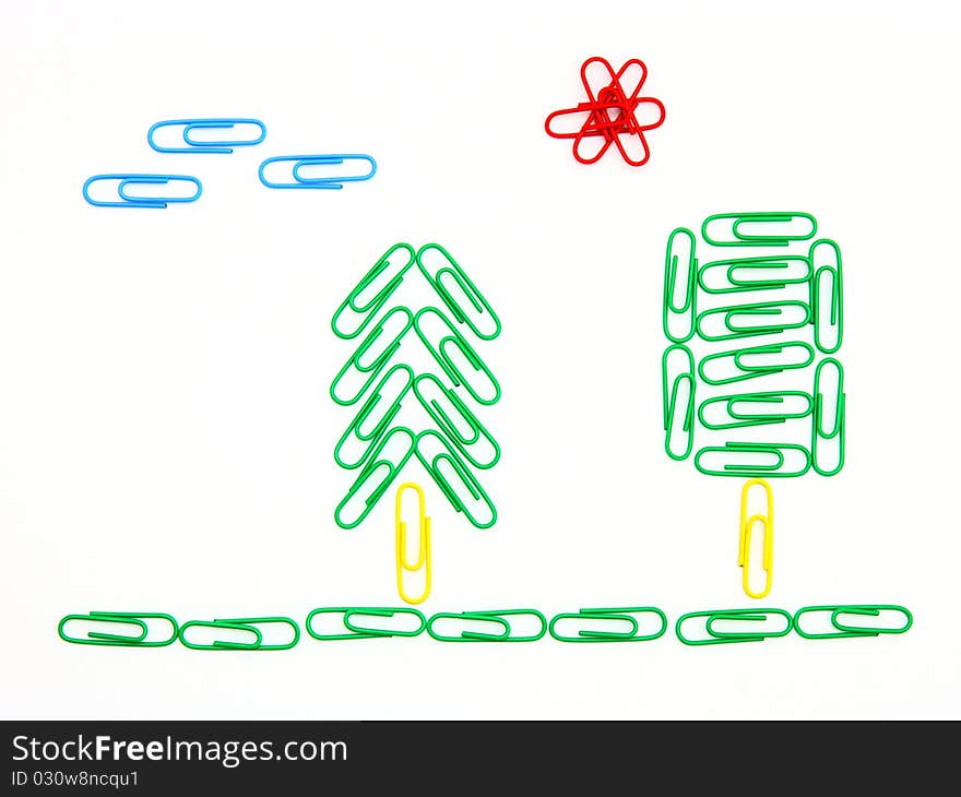 Trees from color paper clips on a white background with clouds and the sun