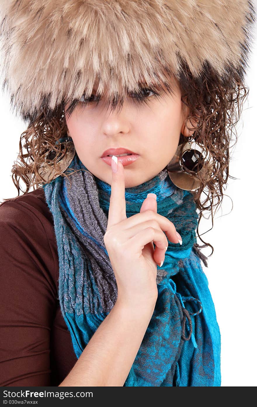 The girl in a cap on a white background