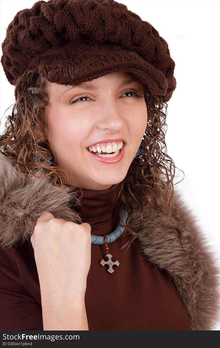 The girl in a cap on a white background