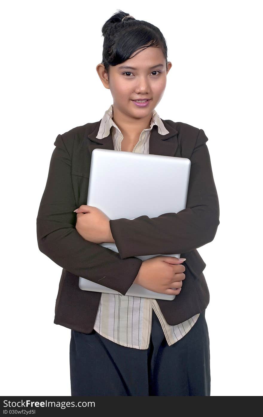 Asian business woman holding laptop isolated over white background