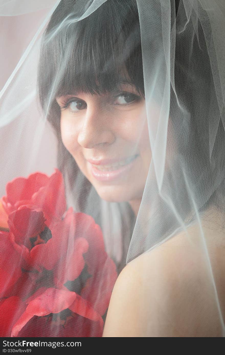 Soft and classic portrait of a smiling bride. Soft and classic portrait of a smiling bride