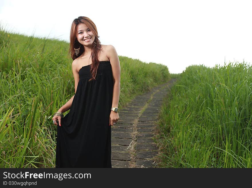 Portrait of the young beautiful smiling woman outdoors. Portrait of the young beautiful smiling woman outdoors