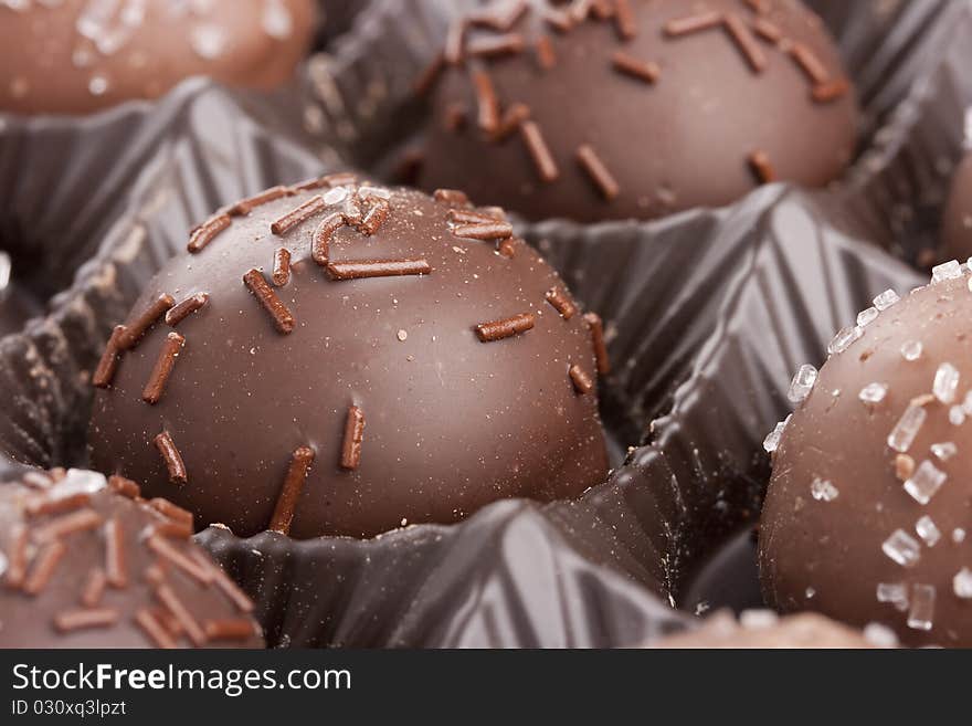 Truffle candy coated chocolate with decorative powdered for the occasion.