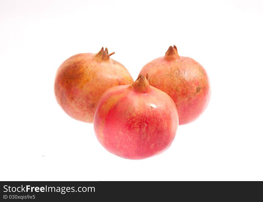 Photo of pomegranate. Isolated on white background