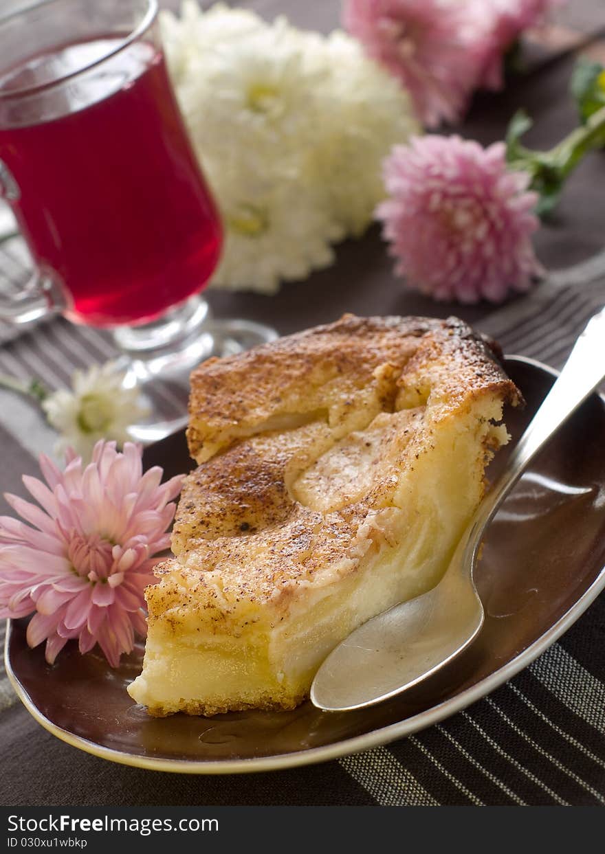 Slice of apple pie and cup of fruit tea. Slice of apple pie and cup of fruit tea