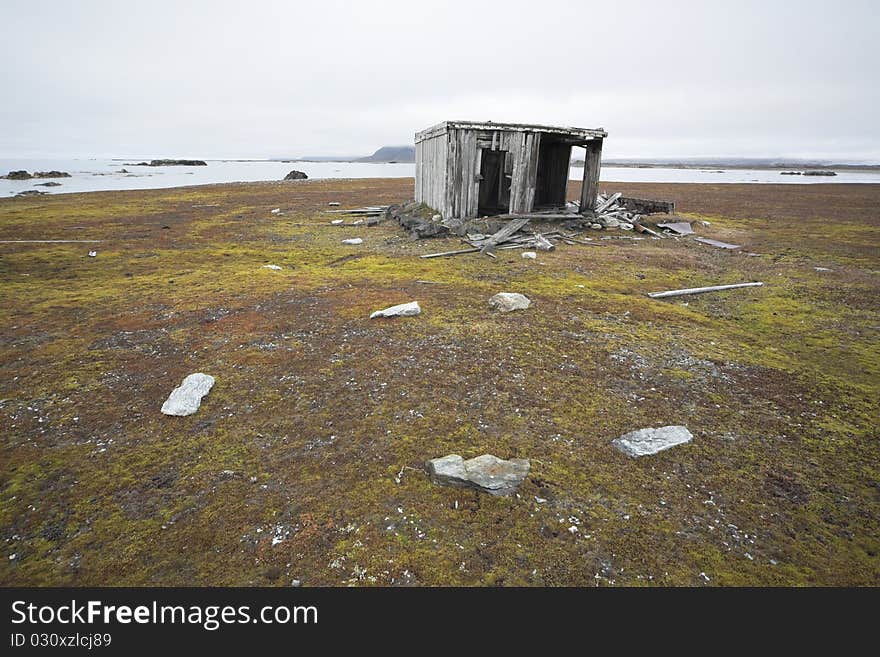 Old, abnandoned, wooden hut on tundra - Arctic, Spitsbergen