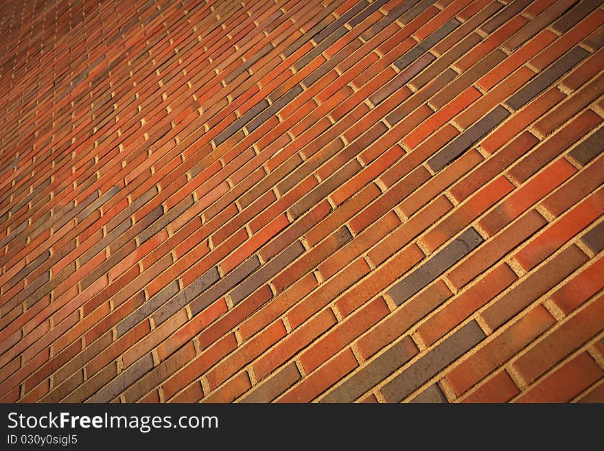 Red brick wall background close-up