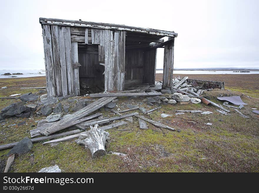 Old, abnandoned, wooden hut on tundra - Arctic, Spitsbergen. Old, abnandoned, wooden hut on tundra - Arctic, Spitsbergen